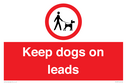 dogs-on-lead-symbol-with-black-text-on-white-background~